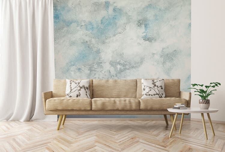 Wall with a travertine effect applied with a decorative stencil